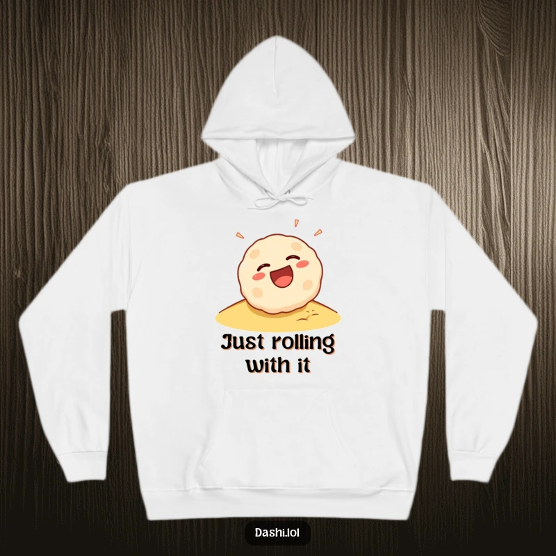Funny Takoyaki Hoodie: A laughing takoyaki ball rolls joyfully down a slope, offering cozy, humorous style.
